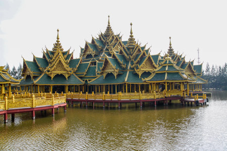 The golden Big pavilion on water in asiaの写真素材