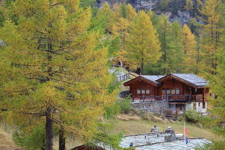 Zermatt, Switzerland-October 21, 2019:View of The Old Building on Furi cable car station in autumn and rainny day. at furi village ,Zermatt ,Switzerland.のeditorial素材