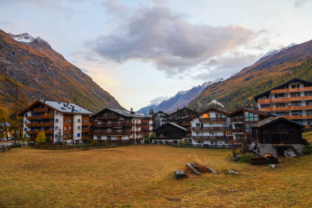 Zermatt, Switzerland-October 21, 2019:The Old Building on Zermatt Bahnhofstrasse street in autumn and rainny day. ,Zermatt is a famous nature village in Switzerland.のeditorial素材