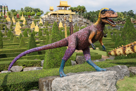 Pattaya,Thailand-January 28,2022:The dinosaurs statue is beautiful for travel in holiday at Nong Nooch Tropical Botanical Gardenのeditorial素材
