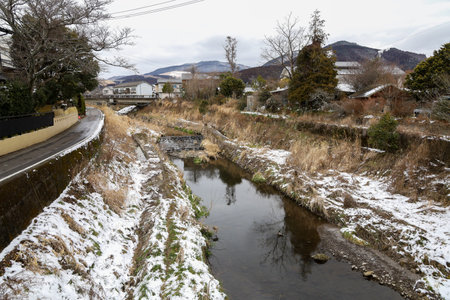 View of landscape Yufuin village in the winter after snow fallの写真素材
