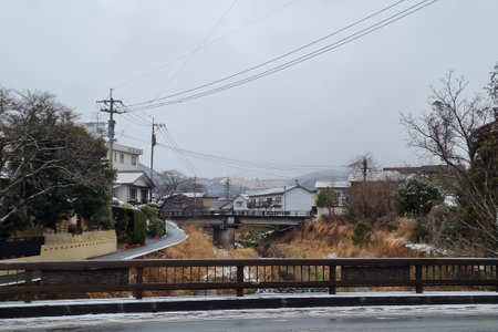 View of landscape Yufuin village in the winter after snow fallの写真素材
