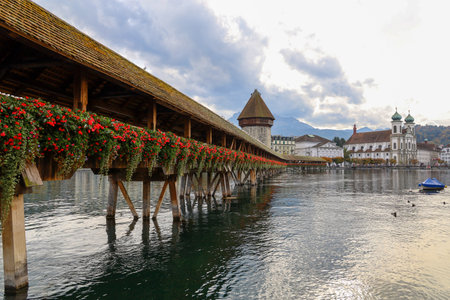 Lucerne, Switzerland-October 18,2019:The old wood Chapel Bridge is famous and beautiful landmark in Lucerne, Switzerlandのeditorial素材
