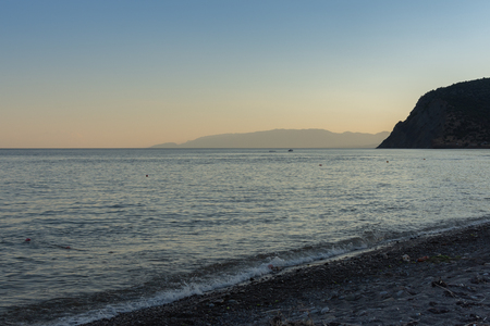 Beautiful sunset on the sea, quiet cozy evening at the seasideの写真素材