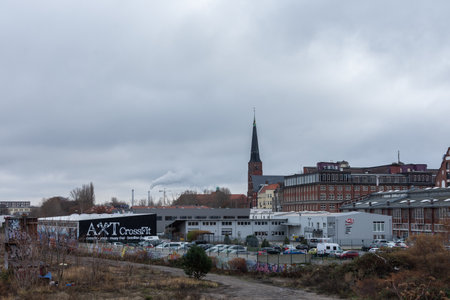 Berlin, Germany- December 12, 2018: view of the Zwinglikirche and the building with parking from the Warsaw Bridge , Friedrichshainのeditorial素材