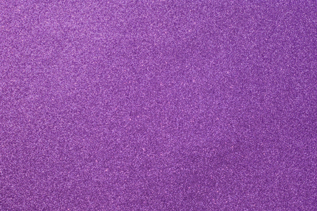 Purple bright shiny grainy background, glitter abstract backgroundの写真素材