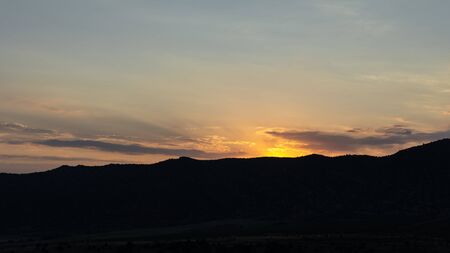 Sunset in the mountains, mountains in the sunlightの写真素材