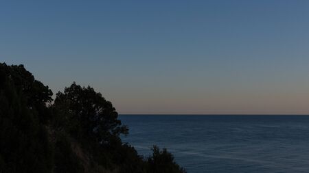 Beautiful sunset on the sea, Vesele bay in the Sudak Municipality of the Crimeaの写真素材