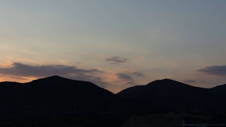 Sunset in the mountains, mountains in the sunlightの写真素材