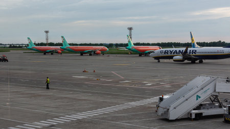 Boryspil, Ukraine - May 22, 2019: runway with airplanes and airport equipment at Borispol airport, airplanes in front of the terminalのeditorial素材