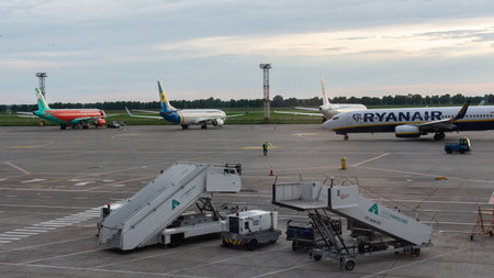 Boryspil, Ukraine - May 22, 2019: runway with airplanes and airport equipment at Borispol airport, airplanes in front of the terminalのeditorial素材