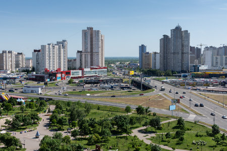Kiev, Ukraine - May 19, 2019: view from the window of the house to the park Pozniaky and the road to Boryspilのeditorial素材