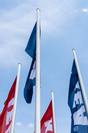 Berlin, Germany- May 24, 2019: IKEA Berlin Store, multicolored flags of IKEA on a background of clear blue skyのeditorial素材