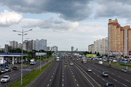 Kiev, Ukraine - May 22, 2019: view to the road to Boryspil in the city of Kiev in the neighborhood Poznyaki on a rainy dayのeditorial素材