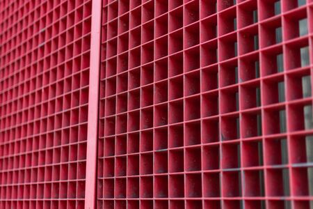 Abstract background with square red iron gridの写真素材