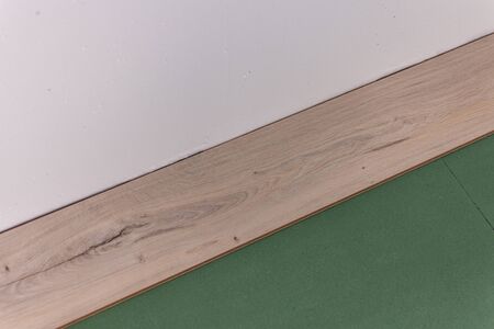 Installation laminate in the room, sheets environmentally friendly underfloor and laminate or parquetの写真素材