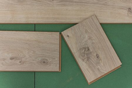 Installation laminate in the room, sheets environmentally friendly underfloor and laminate or parquetの写真素材