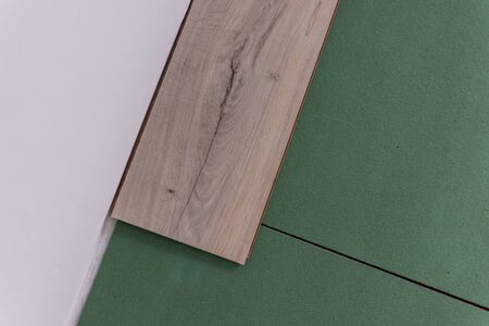 Installation laminate in the room, sheets environmentally friendly underfloor and laminate or parquetの写真素材