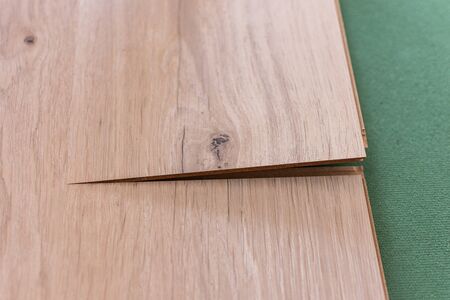 Installation laminate in the room, sheets environmentally friendly underfloor and laminate or parquetの写真素材