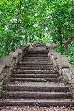 Walk on a warm sunny day in the park Volkspark Friedrichshain in Berlin, stone stairsの写真素材