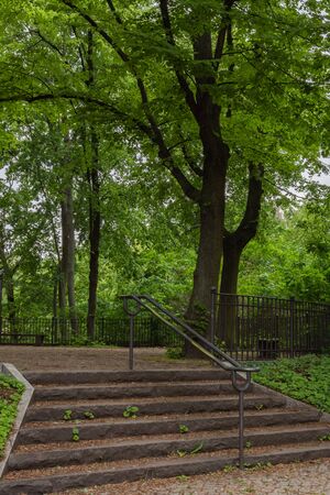Walk on a warm sunny day in the park Volkspark Friedrichshain in Berlin, stone stairsの写真素材