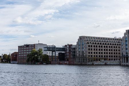 Berlin, Germany- October 6, 2019: view of the other shore from the Spree river embankment near the Oberbaunum bridgeのeditorial素材