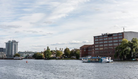 Berlin, Germany- October 6, 2019: view of the other shore from the Spree river embankment near the Oberbaunum bridgeのeditorial素材