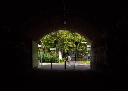Berlin, Germany- October 6, 2019: pedestrian crossing under the railway bridge, exit on Puschkinallee in Treptower Parkのeditorial素材