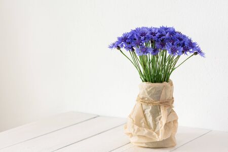 Summer beautiful wildflowers Cornflowers in a vaseの写真素材
