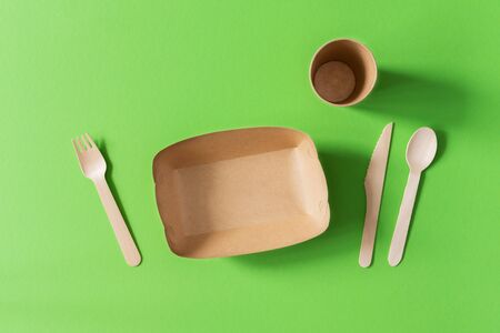 Eco friendly disposable dishes, glass with a plate and cutlery of environmental materialの写真素材