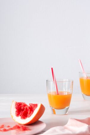 Grapefruit and orange juice, summer refreshing citrus drinkの写真素材
