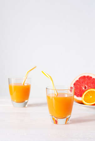 Grapefruit and orange juice, summer refreshing citrus drinkの写真素材