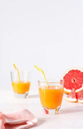 Grapefruit and orange juice, summer refreshing citrus drinkの写真素材