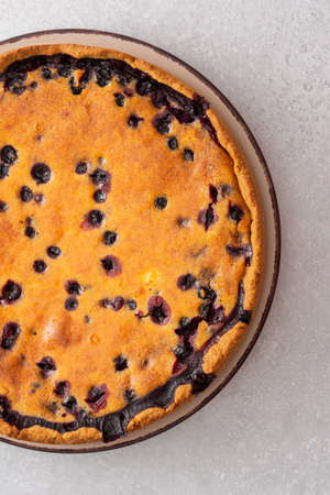 Delicious sweet pie with black currant close up, top viewの写真素材