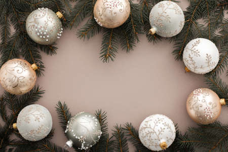 Christmas balls and spruce branches on powdery background, Merry Christmas and Happy New Year concept, top view, copy spaceの写真素材