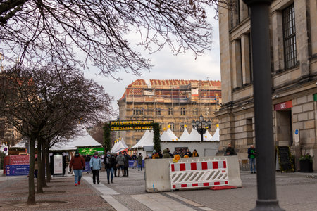 Berlin, Germany - December 27, 2021: a walk in the center of Berlin on a winter day, entrance to the famous Christmas market on the Gendarmenmarktのeditorial素材