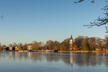 Berlin, Germany - December 26, 2021: a walk along the Spree river and a view of the other bank in Treptower park from Insel der Jugend islandのeditorial素材