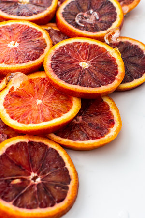Fruit background with blood oranges and ice, delicious sweet fruit, copy spaceの写真素材