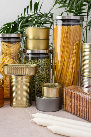 Necessary products for the period of the pandemic or famine or quarantine and isolation, food stock, the concept of stay at home, donated products, grocery deliveryの写真素材