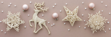 Merry Christmas and Happy New Year banner, Christmas tree decorations and balls with snow on powdery...