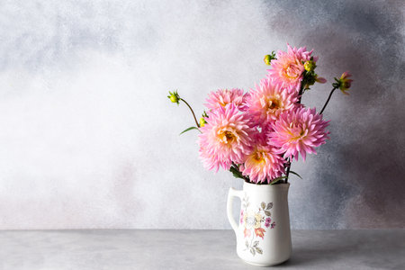 Pink dahlias, beautiful summer flowers in a vaseの写真素材