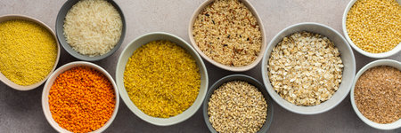 Various grain cereals in bowls banner, top view