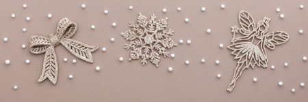 Merry Christmas and Happy New Year banner, Christmas tree decorations and balls with snow on powdery background, top view, copy spaceの写真素材