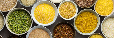 Various grain cereals in bowls banner, top viewの写真素材