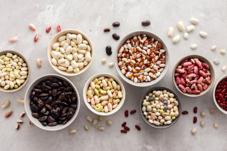 Different types of beans in bowls, economically important legume, top view, copy spaceの写真素材