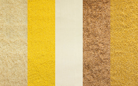 Various grain cereals banner, top view, white rice and millet, semolina and wheat grits, couscousの写真素材