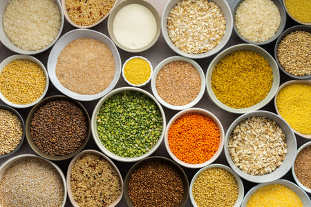 Various grain cereals in bowls on a light background, top viewの写真素材