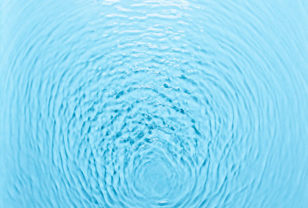 Background with water, waves on the water in the pool during the day, cosmetic moisturizer emulsionの写真素材