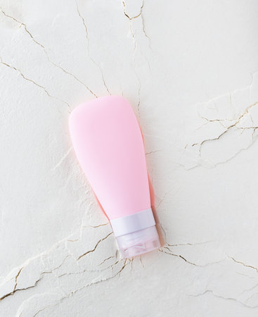 Moisturizing cream on an abstract background with cracks, face and body skin careの写真素材