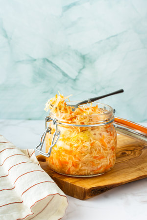 Fresh fermented vegetables, fermented cabbage with carrots, healthy natural probiotics, healthy nutrition, sauerkrautの写真素材